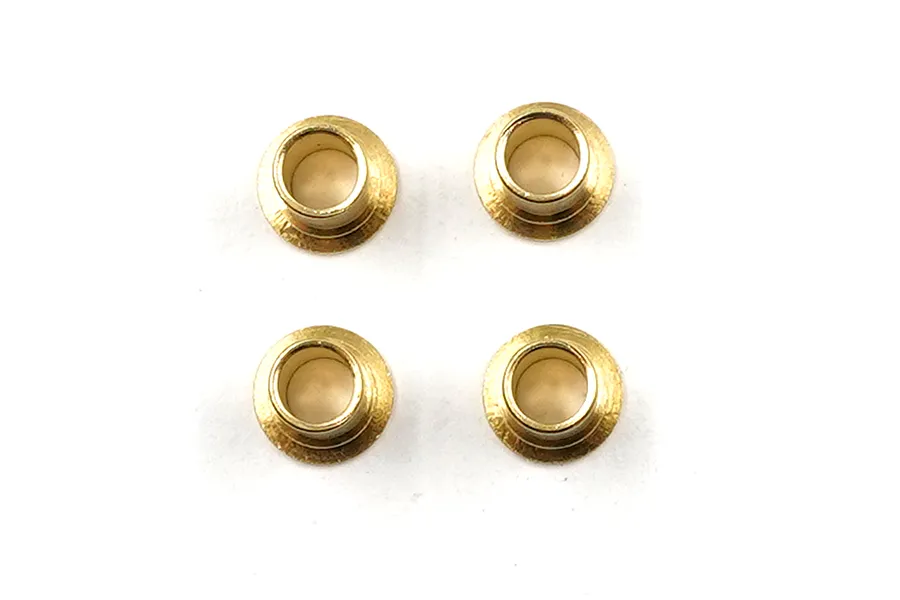 Four small gold-coloured brass flanged bushings arranged in a square pattern against a plain white background.