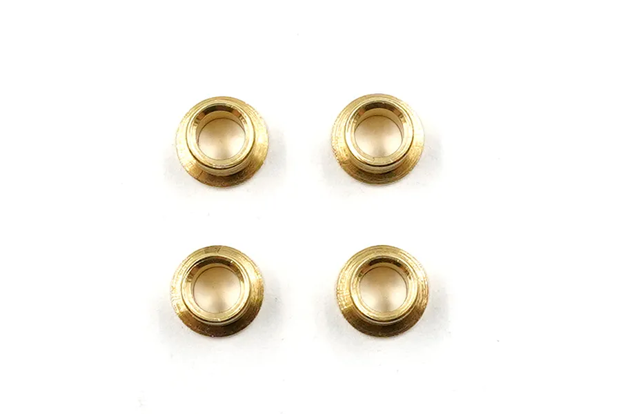 Four small brass flanged bushings arranged in a square pattern against a white background.