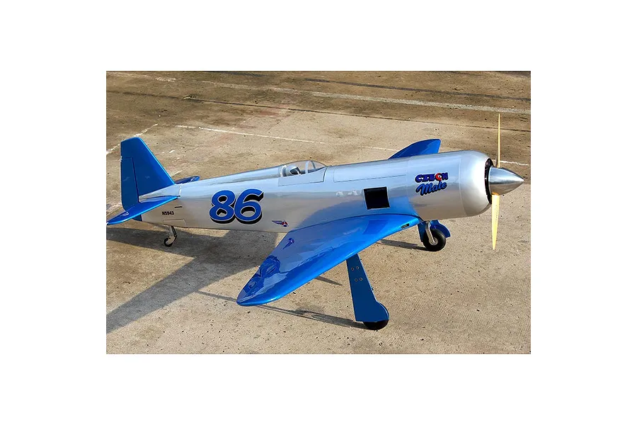 Seagull RC Reno Yak 11 Czech Mate model plane in pearl blue and chrome finish, parked on a concrete runway.