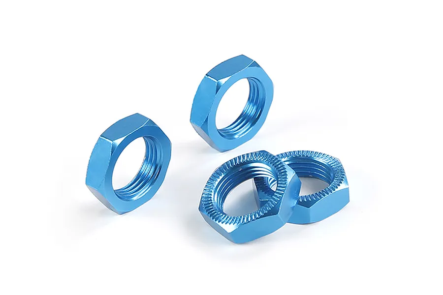 Four blue anodized aluminium hex wheel nuts for RC vehicles, arranged on a white background.
