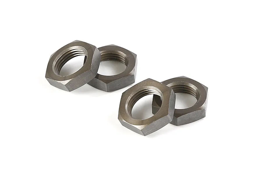 Four gunmetal grey aluminium hex wheel nuts arranged on a white background.