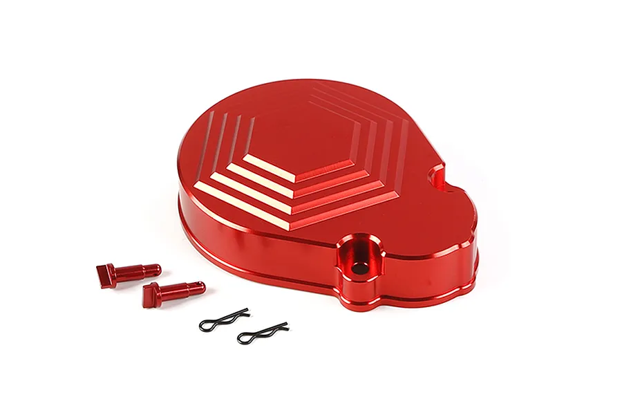 A red anodized aluminium transmission gear cover with a hexagonal pattern, accompanied by two red body pins and two black R-clips on a white background.