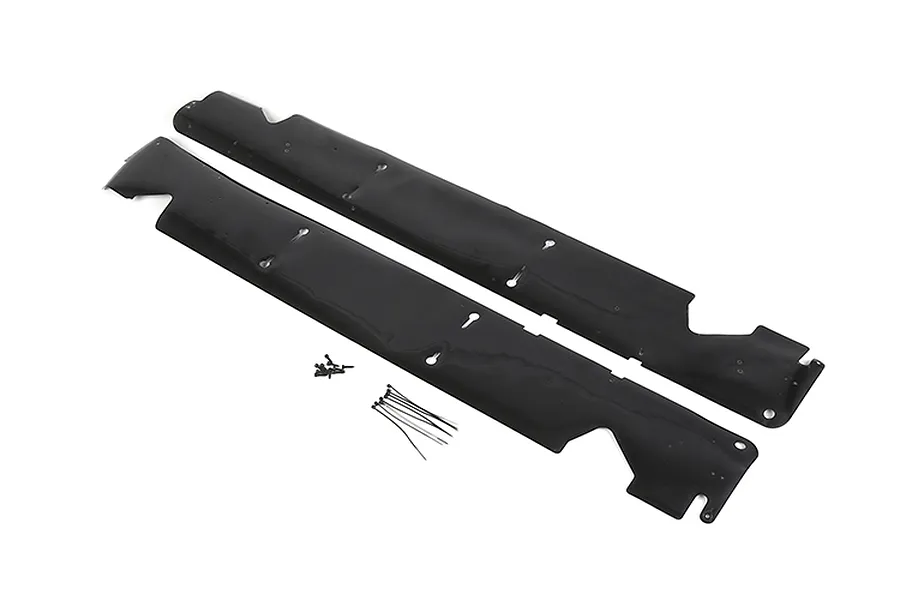 A pair of black RC car dust guards with mounting screws and zip ties on a white background.