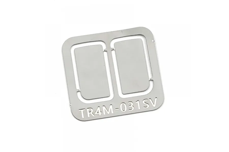 A silver-colored metal sheet containing two rectangular mirror plates for an RC vehicle, labeled with the part number TR4M-031SV.
