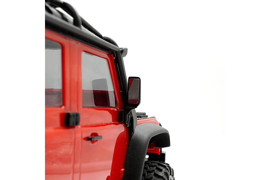 Close-up of a red RC crawler vehicle showing the side mirror and roof rack against a white background.