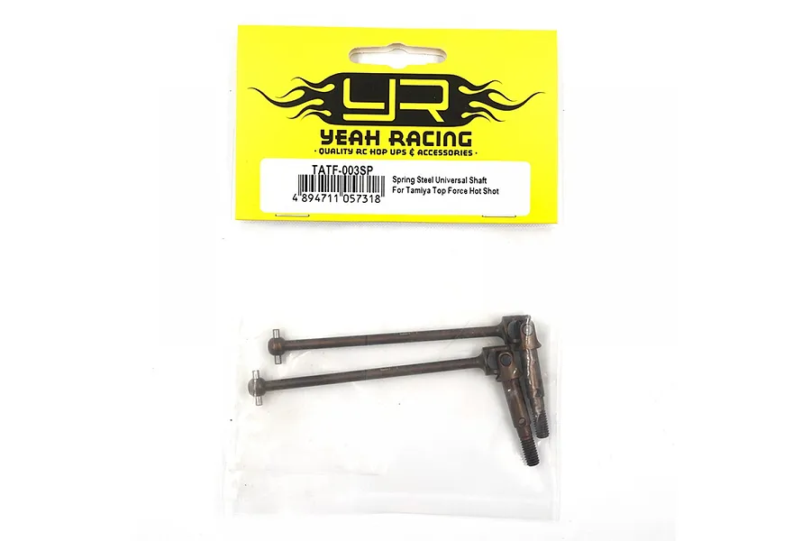 Two Yeah Racing spring steel CVD driveshafts in original yellow and white retail packaging.