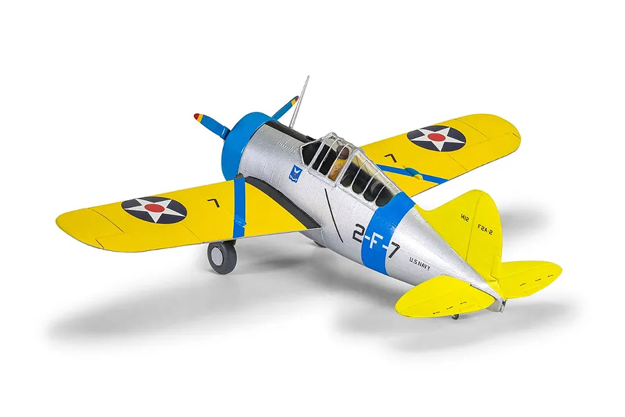 A fully assembled and painted 1/72 scale plastic model of a Brewster Buffalo fighter aircraft in US Navy livery with yellow wings and silver fuselage.