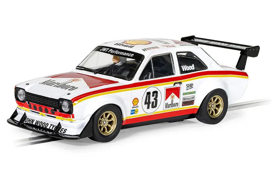 A 1/32 scale Scalextric Ford Escort MK1 RSR slot car in white with red and yellow racing livery, featuring number 43 and Marlboro branding.