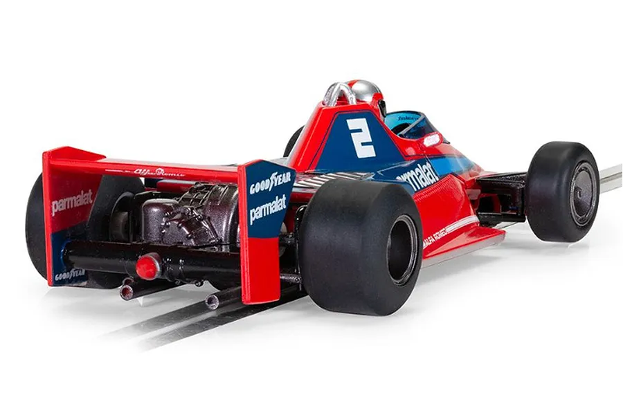 Rear three-quarter view of a red and blue Scalextric 1/32 scale Brabham BT46 slot car with number 2 livery on a track.