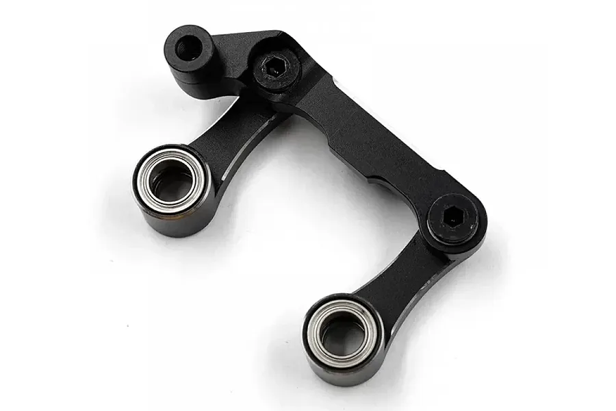A black anodized aluminium RC steering bell crank assembly with two ball bearings installed, isolated on a white background.
