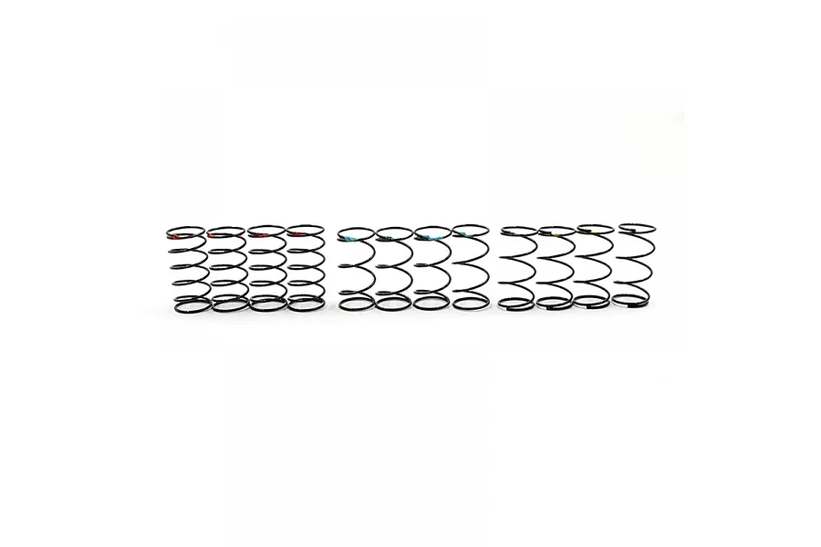 A set of twelve black RC shock springs arranged in three groups of four, each featuring small colored paint markings on the top coils.