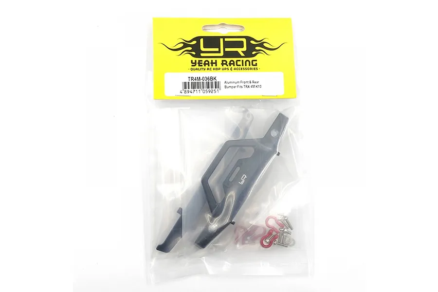 Yeah Racing black aluminium front and rear bumpers for TRX-4M in original retail packaging with mounting hardware and red shackles.
