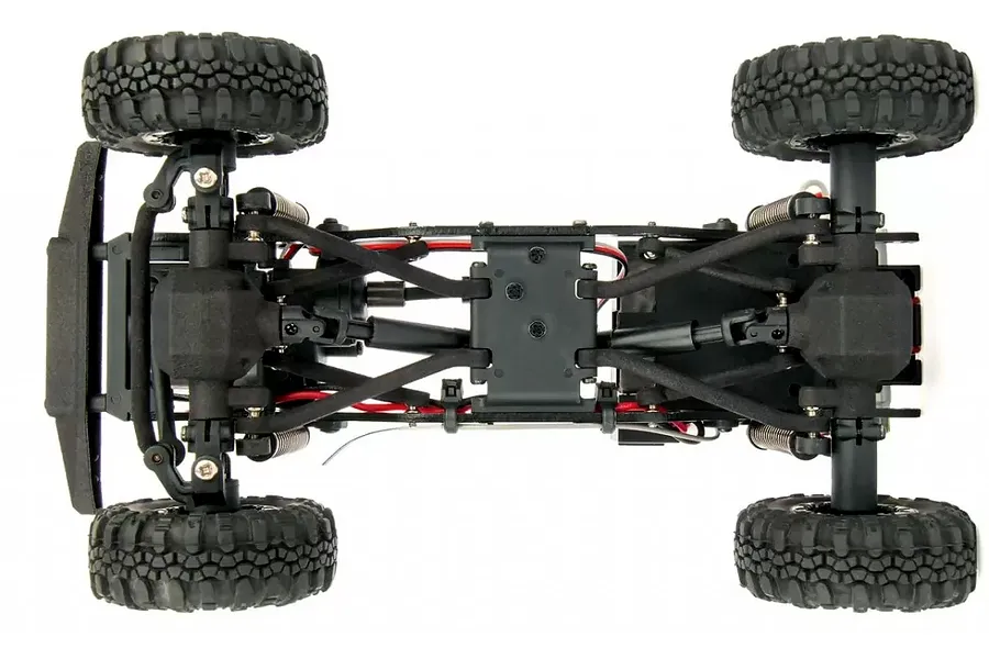 Top-down view of the chassis of an Element RC Enduro24 Ecto 1/24 scale rock crawler, showing the drivetrain, suspension, and wheels.