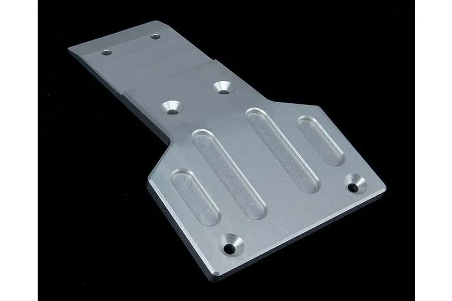 A silver aluminium front skid plate for an RC car, featuring a machined design with countersunk screw holes, isolated against a black background.