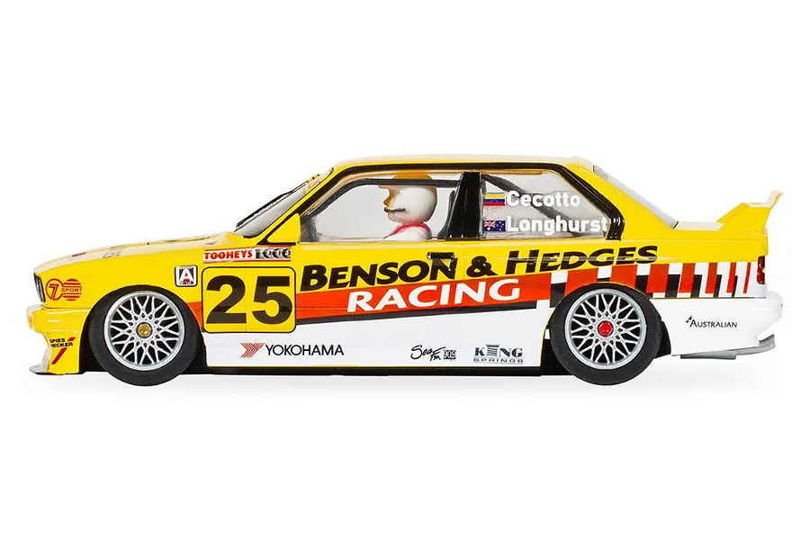 Side view of a yellow Scalextric 1/32 scale BMW E30 M3 slot car, number 25, featuring Benson &amp; Hedges Racing livery.