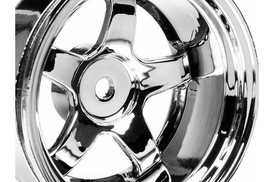 A close-up view of a shiny chrome five-spoke RC car wheel rim against a white background.
