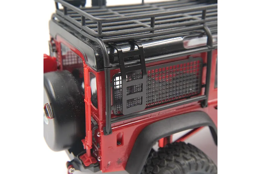 A black aluminium side ladder mounted on the side of a red RC crawler vehicle with a roof rack.