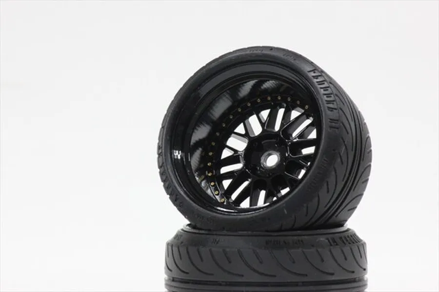 Two black Pandora RC RWB M-1 display rims with tires stacked against a white background.