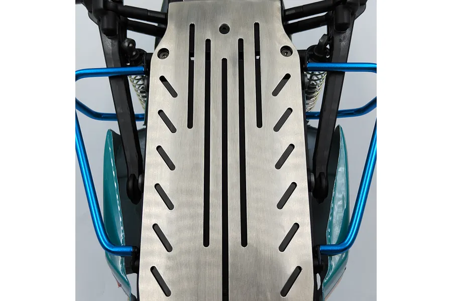 Top-down view of an RC car chassis featuring blue aluminium side bumpers and a central metal skid plate.