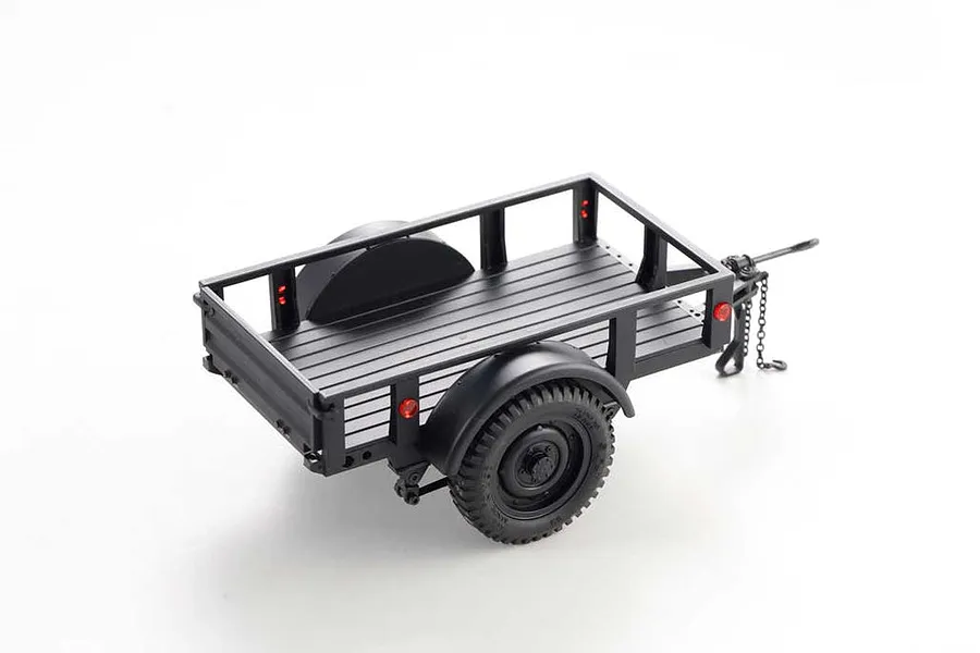 A black 1/18 scale utility trailer for RC vehicles, shown from a rear three-quarter angle against a white background.