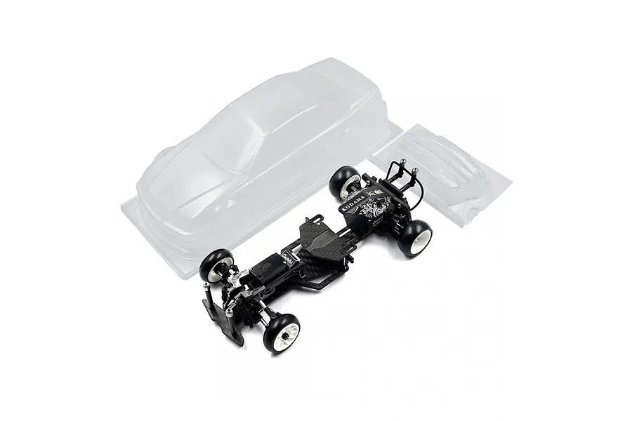 Yeah Racing Onisiki Kodama 1/24 scale RC drift car chassis with an unpainted clear polycarbonate body shell.
