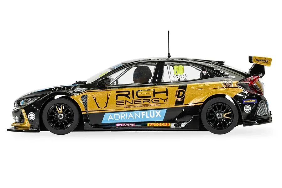 Side profile of a 1/32 scale Scalextric Honda Civic FK8 Type R BTCC slot car in black and gold Rich Energy livery.