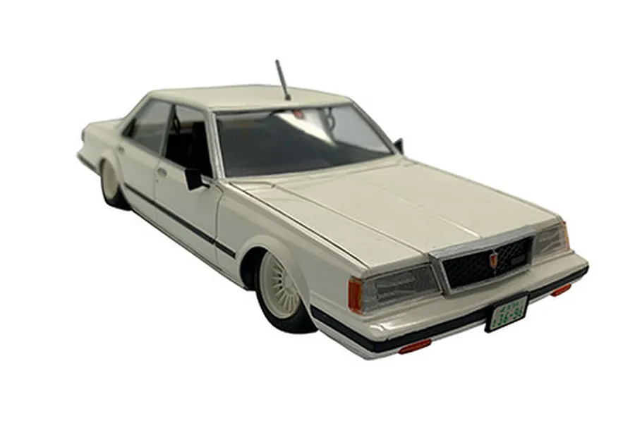 A white Fujimi 1/24 scale Toyota Mark-II GT Grande plastic model car, shown from a high-angle front three-quarter view.