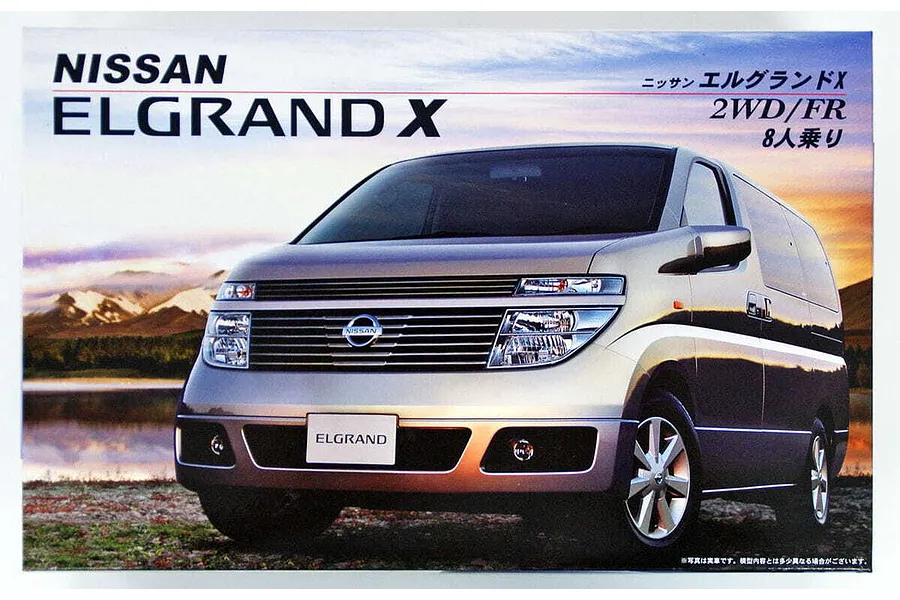 Product box art for a Fujimi 1/24 scale Nissan Elgrand X plastic model kit, featuring a silver van against a sunset landscape background.