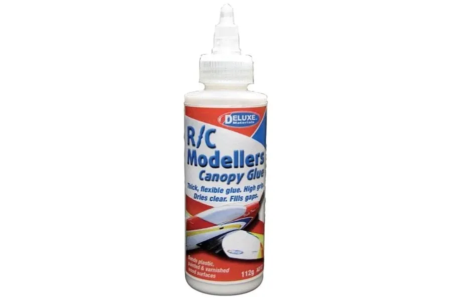A bottle of Deluxe Materials R/C Modellers Canopy Glue, featuring a white squeeze bottle with a blue and red label.