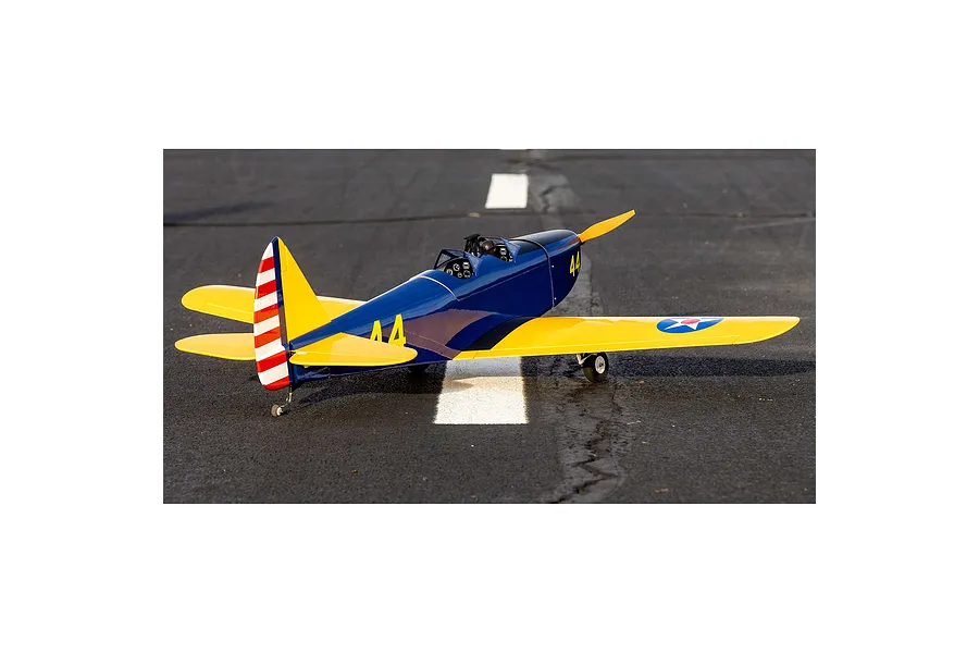 A Hangar 9 PT-19 RC warbird model plane sitting on an asphalt runway, featuring a blue and yellow paint scheme with the number 44 on the side.