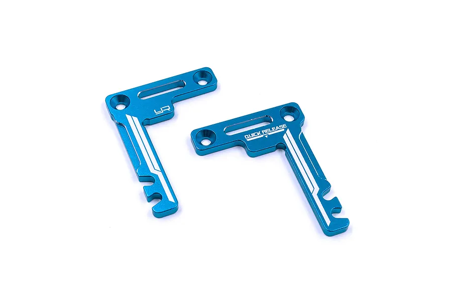 Two blue anodized aluminium L-shaped RC battery holder brackets by Yeah Racing on a white background.