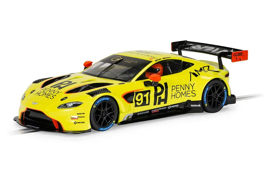 A 1/32 scale Scalextric Aston Martin GT3 Vantage slot car in bright yellow with Penny Homes Racing livery, number 91, on a track.