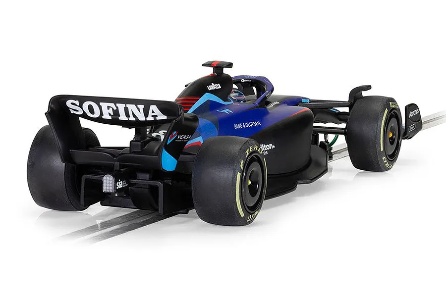 Rear three-quarter view of a Scalextric 1/32 scale Williams FW44 Formula 1 slot car, featuring blue and black livery with sponsor decals on a track.