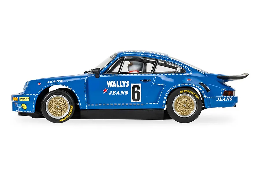 Side view of a blue Scalextric 1/32 scale Porsche 911 Carrera RSR 3.0 slot car with Wallys Jeans livery and number 6.