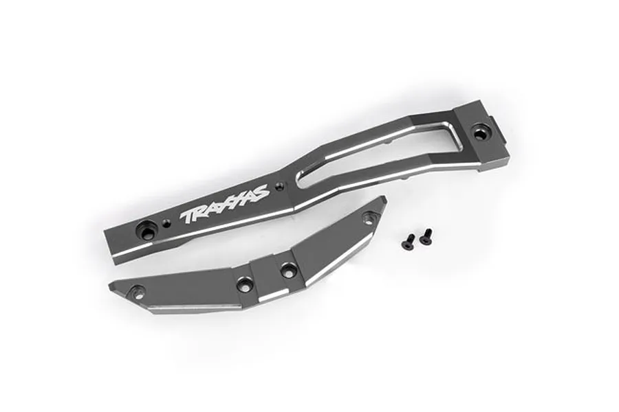 A grey anodized aluminium chassis brace set for Traxxas RC vehicles, including two metal brace components and two small black mounting screws.