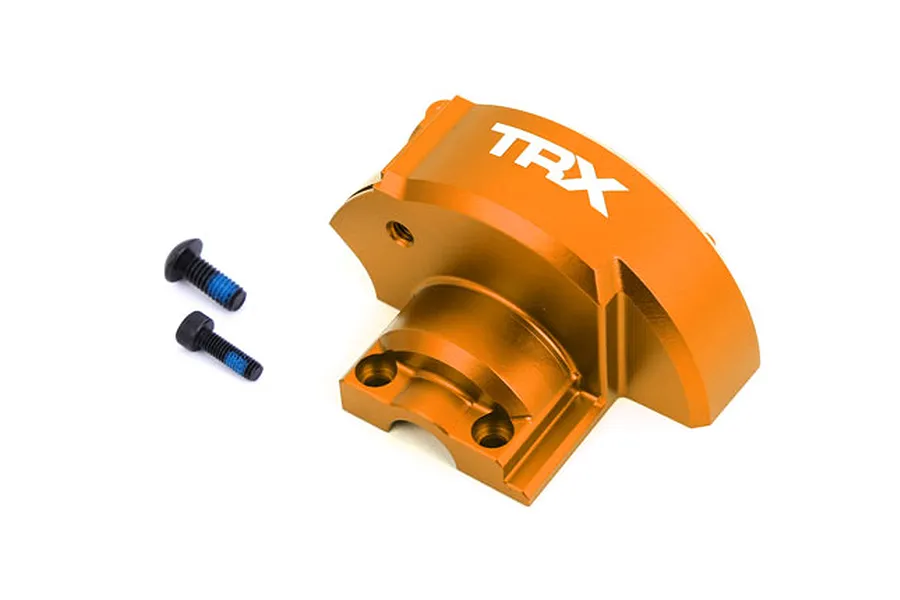 An orange anodized aluminium gear cover for Traxxas RC vehicles, featuring the TRX logo, accompanied by two black mounting screws.