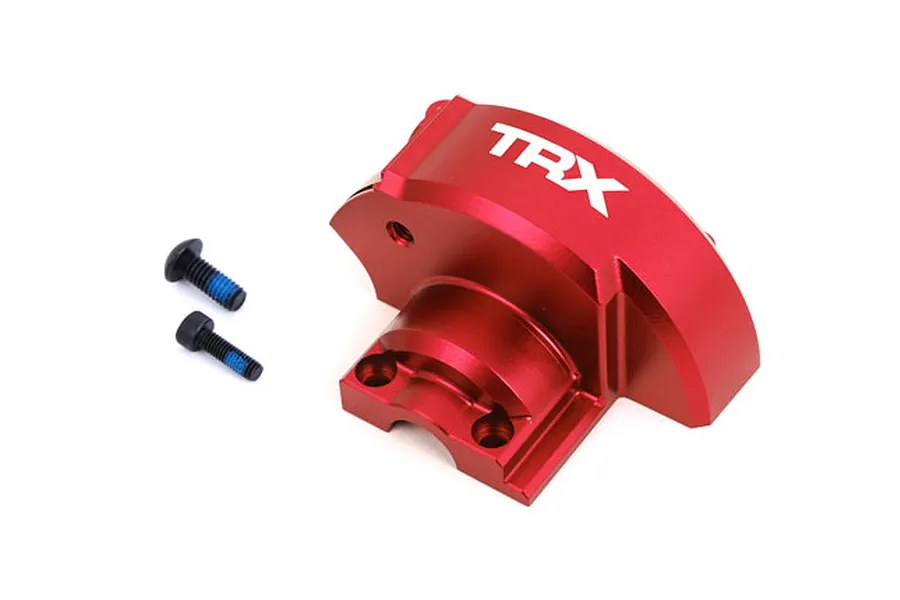 A red anodized aluminium gear cover for Traxxas RC vehicles, featuring the TRX logo, accompanied by two black mounting screws.