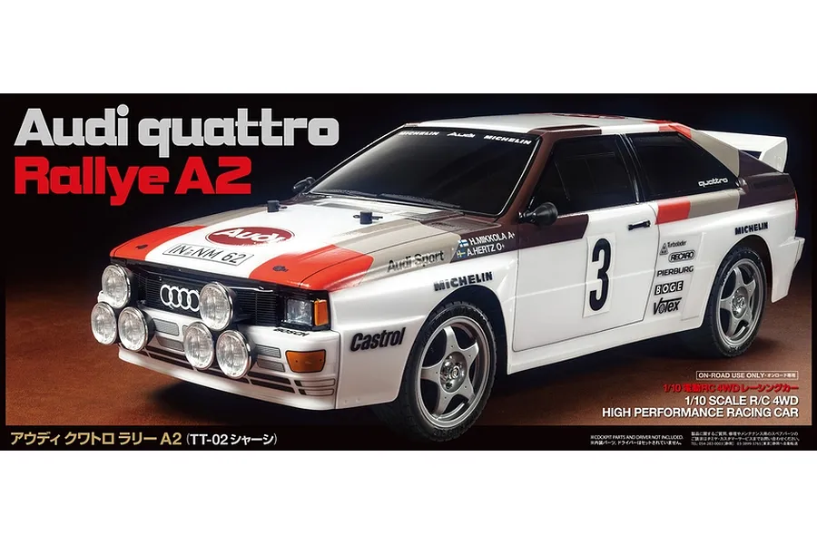 Tamiya Audi Quattro Rallye A2 RC car kit box art showing the finished model with white, red, and brown livery.