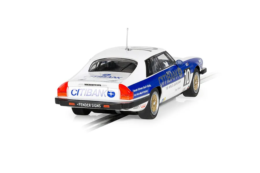 Rear three-quarter view of a white and blue Scalextric 1/32 scale Jaguar XJS slot car with Citibank livery on a track.