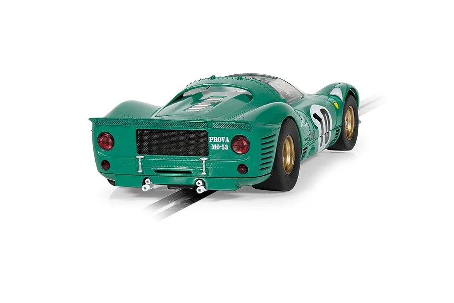 Rear three-quarter view of a green Scalextric 1/32 scale Ferrari 330 P4 slot car on a track.