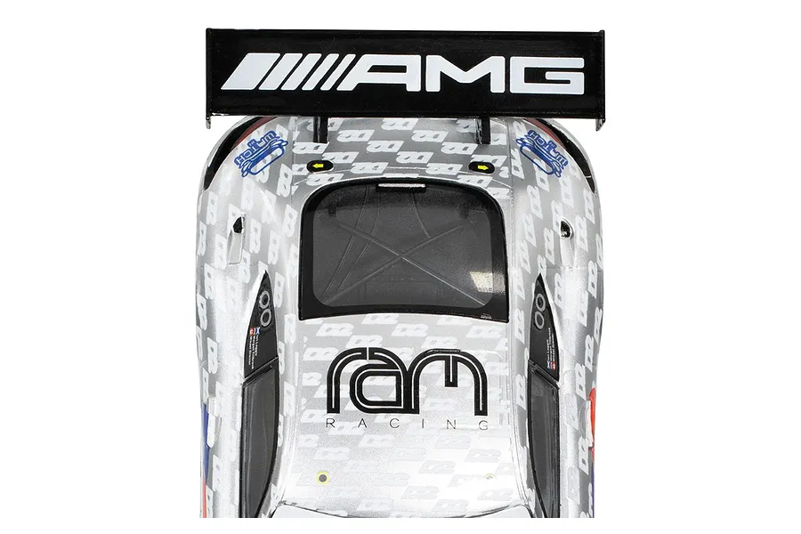 Top-down view of a silver Scalextric Mercedes-Benz AMG GT3 slot car featuring Ram Racing livery and a large black rear wing with AMG branding.