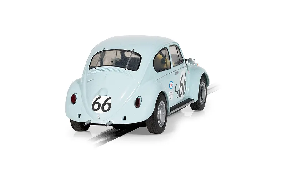 A rear three-quarter view of a light blue Scalextric 1/32 scale Volkswagen Beetle slot car with number 66 racing decals on a white background.