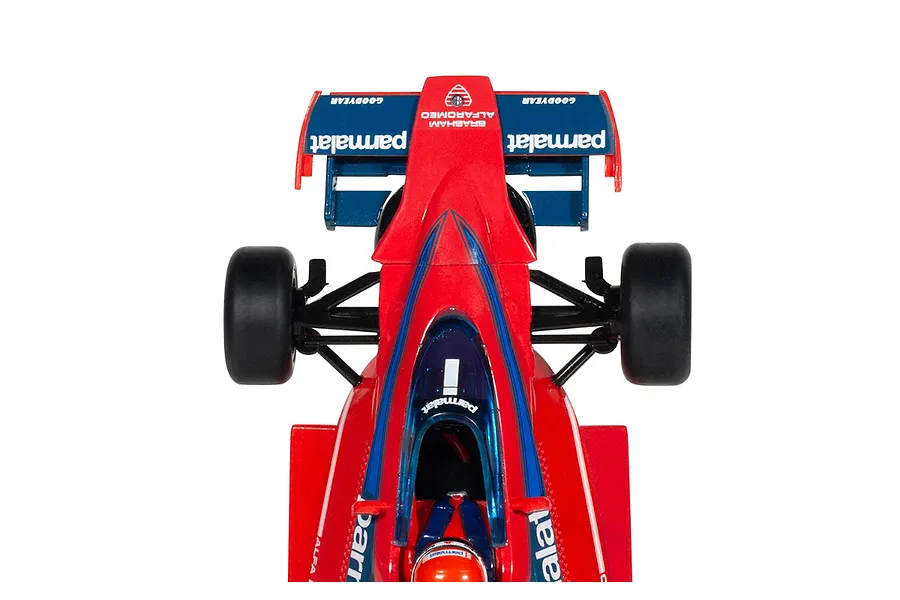 Top-down view of a red Scalextric 1/32 scale Brabham BT46 slot car featuring Parmalat branding and Niki Lauda's driver figure.