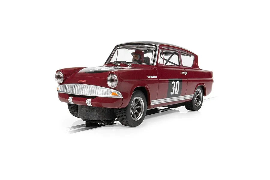 A 1/32 scale Scalextric Ford Anglia 105E Broadspeed slot car in dark red with number 30 on the door, viewed from a front three-quarter angle.