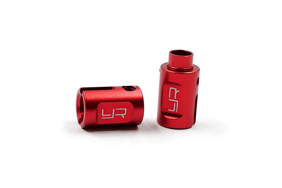 Two red anodized aluminium centre driveshaft cups for RC cars, featuring the Yeah Racing logo laser-etched on the side.