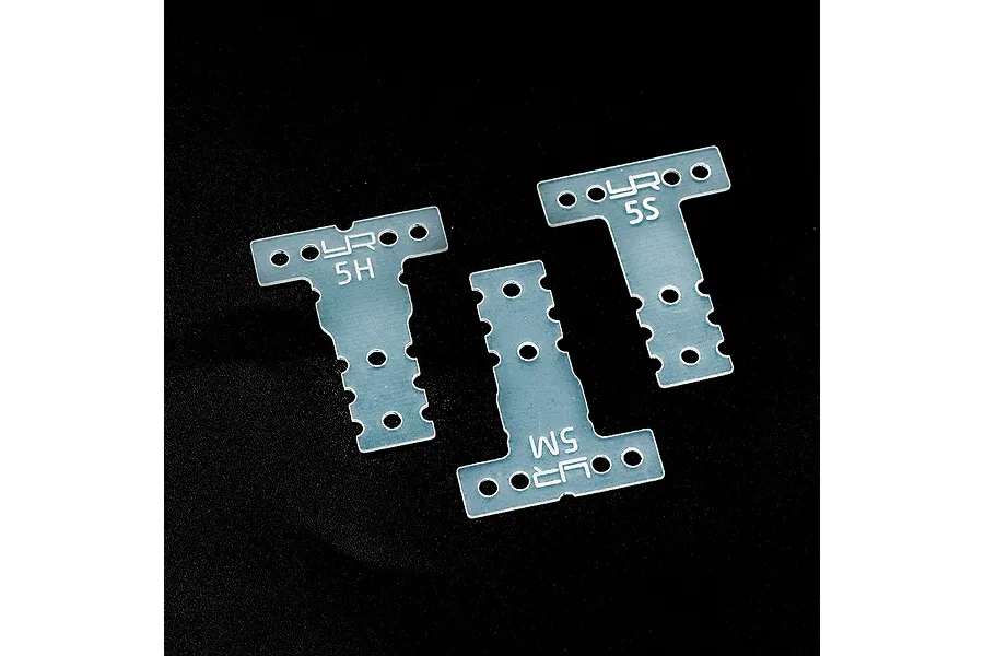 Three translucent Yeah Racing T-plates for 1/28 scale RC cars, labeled 5H, 5M, and 5S, arranged on a black background.