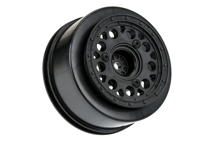 A single black Pro-Line 2.2/3.0 inch short course RC wheel rim shown from a three-quarter angle against a white background.