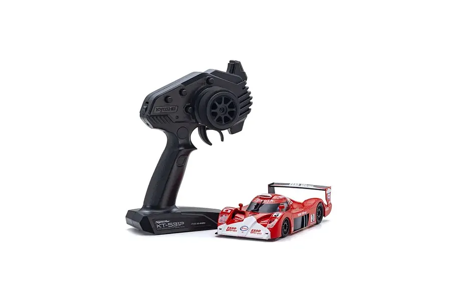 Kyosho Mini-Z Toyota GT-One TS020 RC car in red and white livery with its black KT-531P pistol-grip radio transmitter.