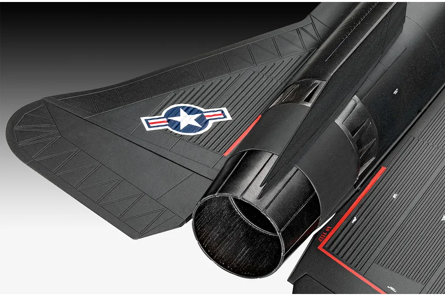 Close-up of a plastic model SR-71 Blackbird aircraft showing the engine exhaust nozzle, wing detail, and US Air Force insignia decal.