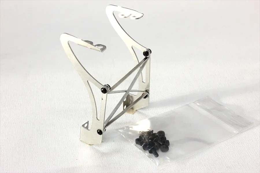 A silver aluminium swan neck rear wing mount for 1/10 scale RC cars, shown with a small bag of black mounting screws on a white background.